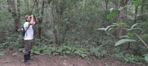 Ranger Jarrinton observing birds on Global Big Day