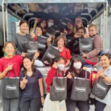 Team distributing the bags in 2022
