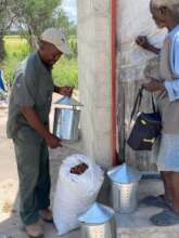 EfA team members distributing chili and supplies.