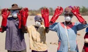 Farmers test out protective equipment.