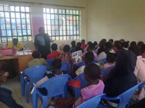 A teacher engaging the girls during mentorship