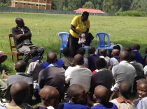 Gladys demonstrating how to use sanitary towels