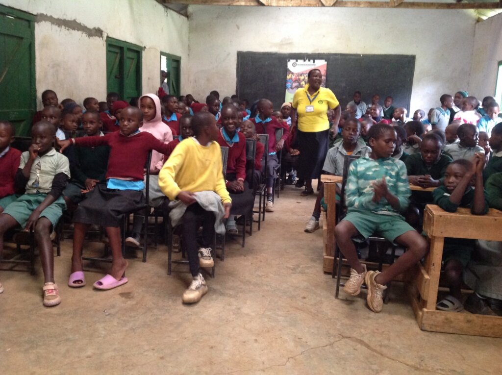 Gladys educating learners on menstrual hygiene