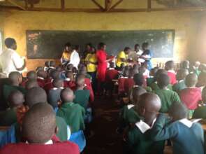 HFAW staff & teachers distributing the pants