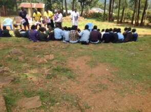 HFAW team distributing the menstrual kits