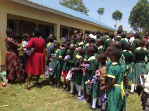 Teachers assist in distribution of  dignity packs