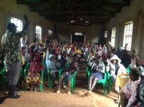 Chief explain to girls on FGM and menstrual Health