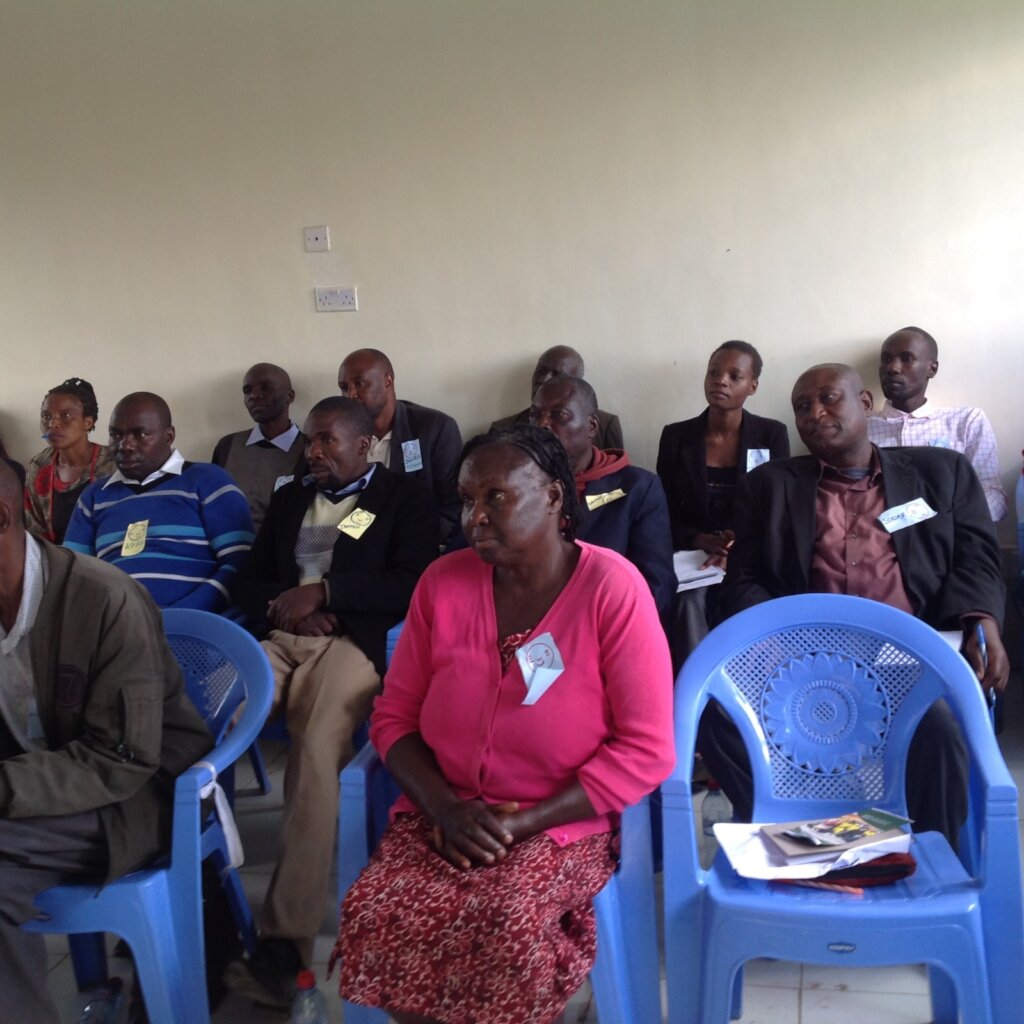 Participants actively listening during the session