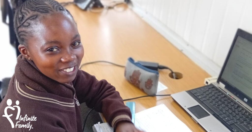 A Net Buddy works on applications to university.