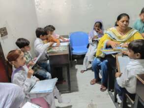 noreen with students during exams