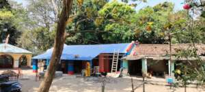 Kitchen under repair, with adjoining residence