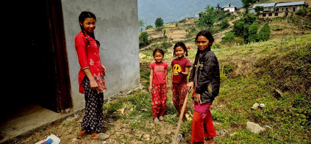 Children are cleaning up their learning center.