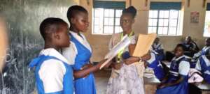 Student at a school with Field for Humanity team