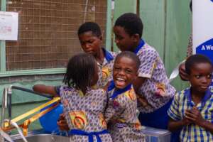 Picture of school children washing their hands