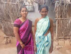 Seeniyammal (right) with the staff team member who