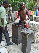 Employees manufacturing Biosand filters