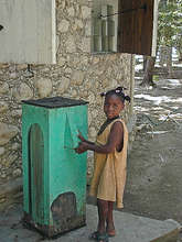 Girl at her family's water filter