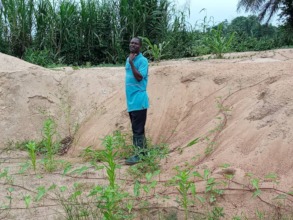 Contracted worker standing in the dug Foundation.