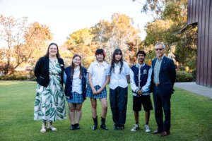 Students, their TFA Alum teacher & Prinicpal