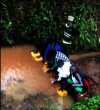 Local residents collect water
