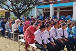 Graduates depart, parents smile, future unknown