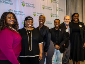 DELVONTE (3rd from R), PANELISTS & BOARD