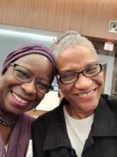 Member Kimberly (L) and Coach CJ enjoy a visit!