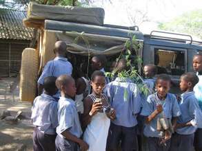 CHILDREN RECEIVING TREES
