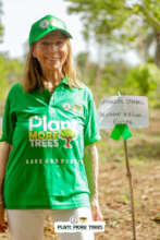 Proud president of ABSWP next to a planted tree