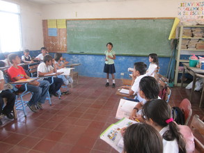 Child Reading Poetry in Class