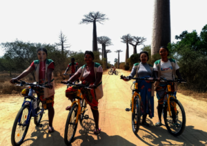 Women Rangers on a bicycle monitoring patrol