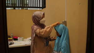 Nurses measure child growth and development