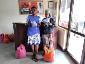 Giving Chicken to Widows with children