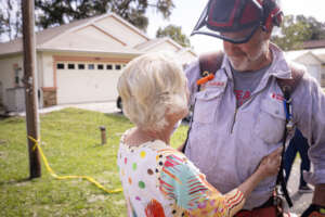 Affected homeowner embraces Team Rubicon volunteer
