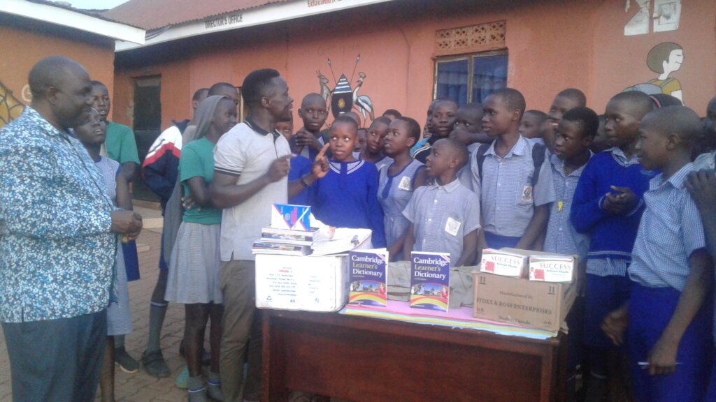 SUPPORT TO CHILDREN WITH SCHOLARSTIC MATERIALS