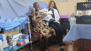 Viola receiving her antenatal care package