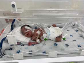 Caleb in an incubator shortly after birth