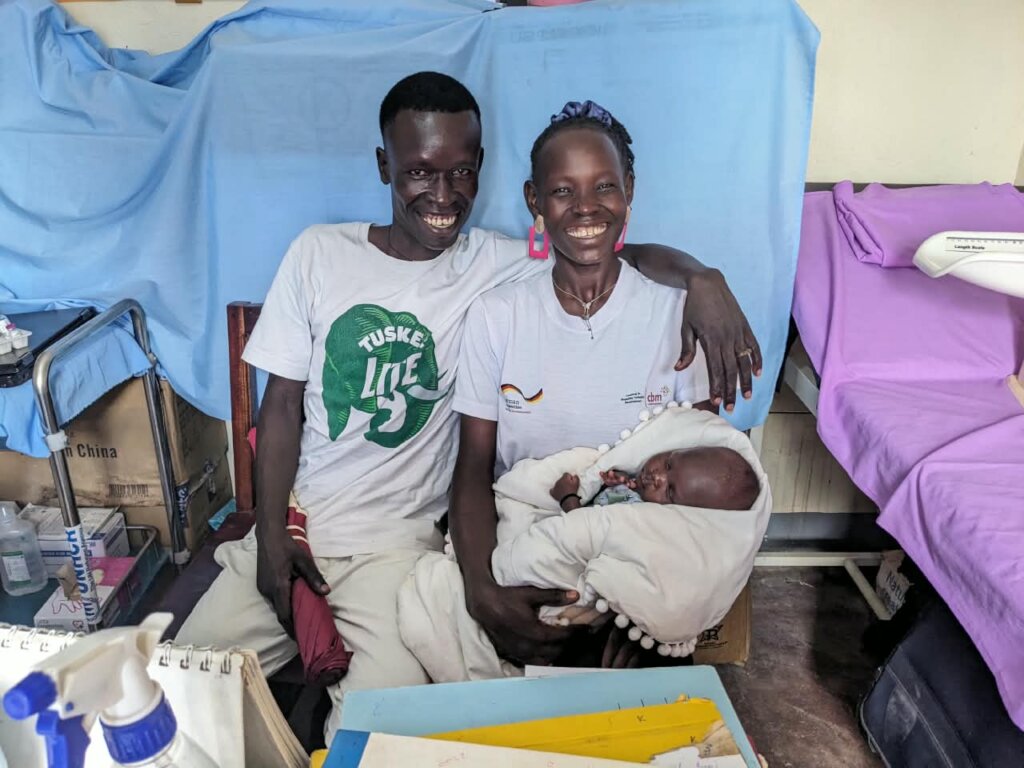 Viola visiting the clinic for postnatal check-up