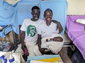 Viola visiting the clinic for postnatal check-up