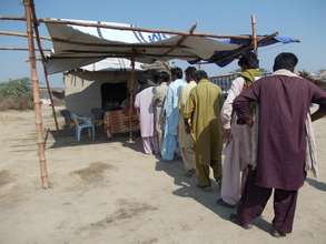 Food token distribution among 2012 Flood victims