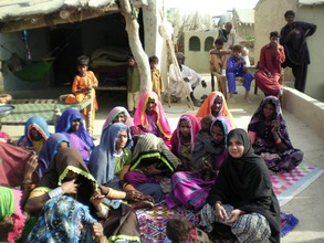 Women sharing their needs food & medical aid