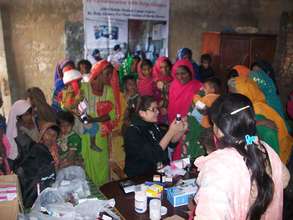 AHD mobile team in a village for medical camp