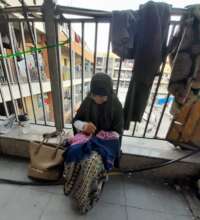 Embroiderer at the school-turned-shelter, Gaza