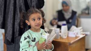 A young girl at an Anera health clinic