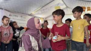 Students at a temporary learning space in Gaza