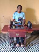 Comfort in her new Shop with Sawing Machine by GEM