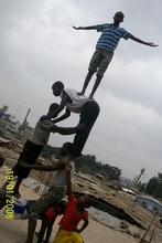 GSCH Tumbling Club with Mathare Slum in Back