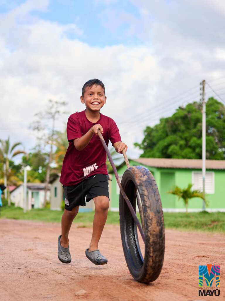 Child playing in Kumarakapay
