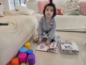 Child with home activity kit during the war