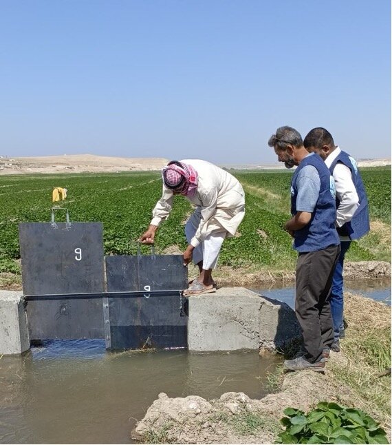 Team Installing Irrigation Control Gates